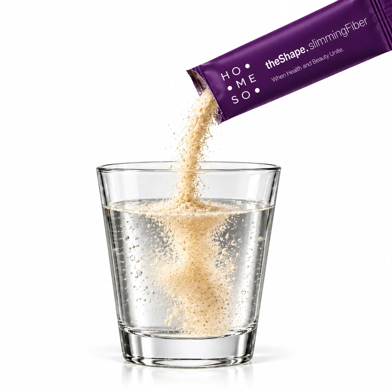 Fibre powder pouring from a sachet of HoMEso theShape. slimmingFiber into a glass of water